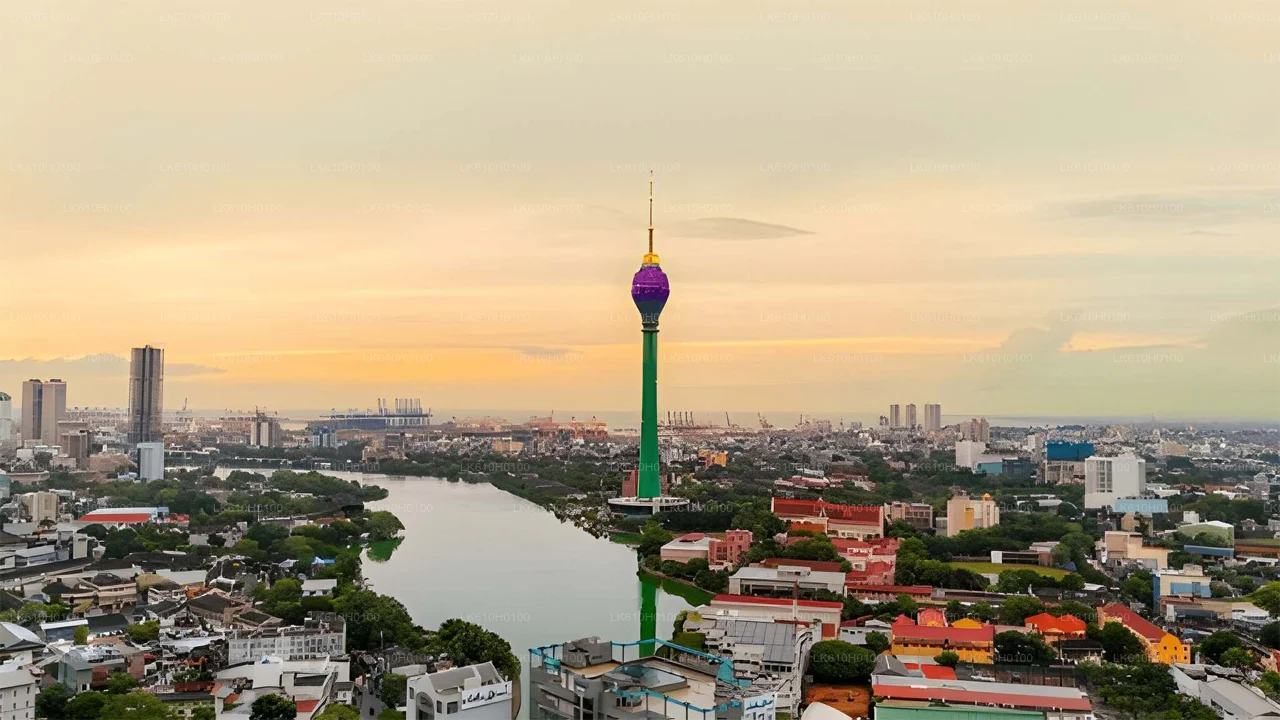 Colombo skyline and Lotus Tower beside Beira Lake at sunset