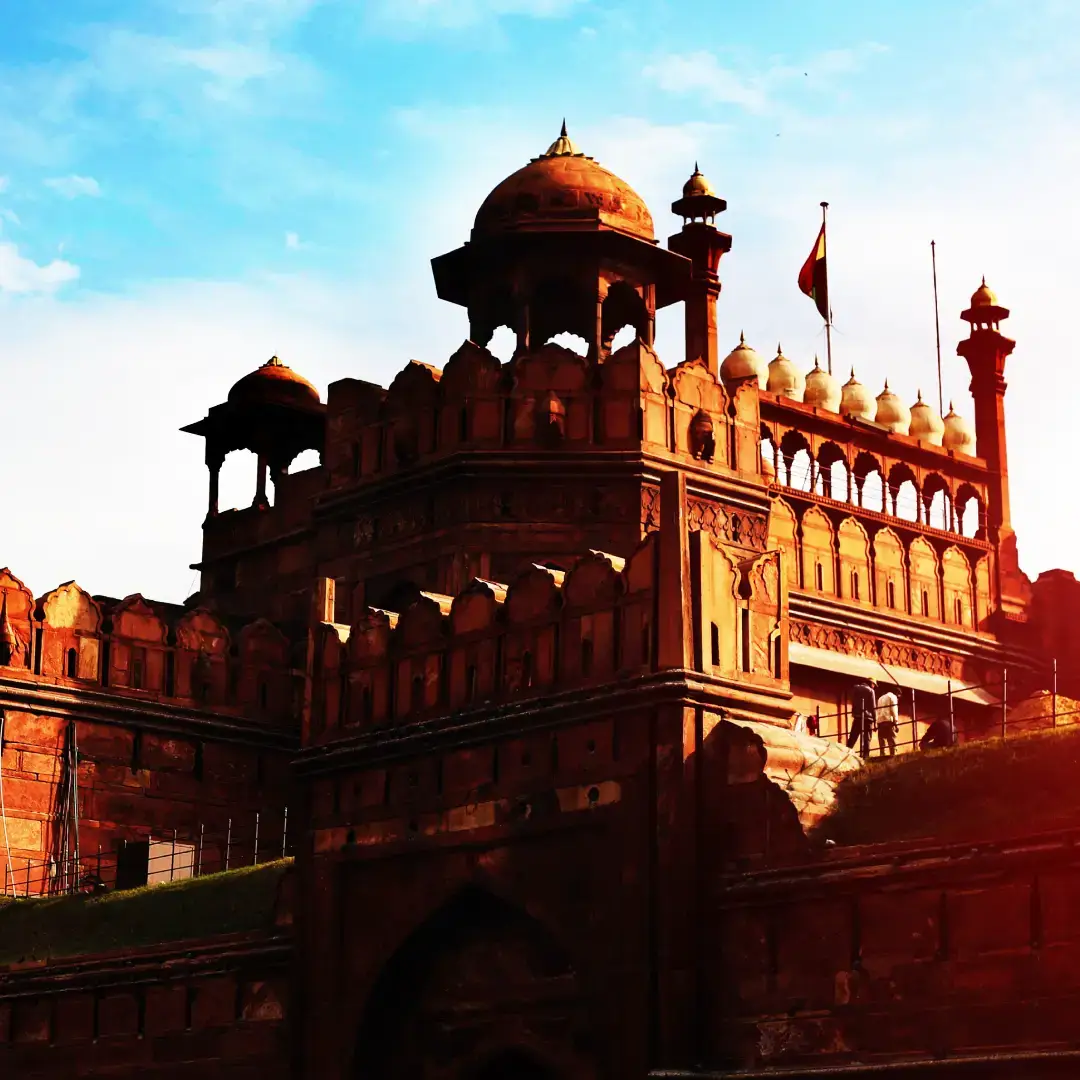 Red sandstone fort architecture with the Indian flag