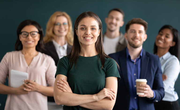 A diverse group of professionals in a workplace portrait